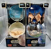 Front view of both boxed Complete Galaxy sets side by side