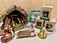 Group shot of entire lot showing stable, figures, ornaments, sled