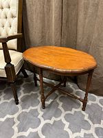 Full view of side table beside chair