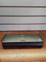 Top view of closed Canon P-215II scanner