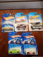 Group shot of five sealed Hot Wheels cars