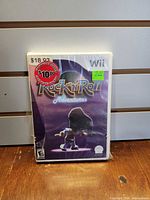 Front of sealed Rock n Roll Adventures Wii game showing cover art and price stickers