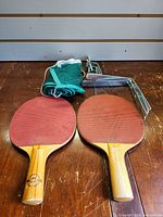 Overall view showing two paddles, net and clamps