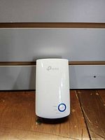 Front view showing TP-Link logo and WPS/LED button