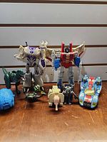 Group shot of all transforming toys