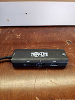 Top view showing Tripp Lite logo and front ports (HDMI, USB-A, USB-C)