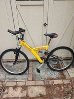 Full left side view of yellow Minelli Tim Hortons 2000 mountain bike