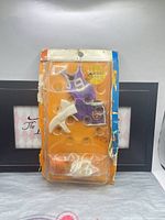 Front of sealed Big Jim Basketball set showing purple jersey and accessories in damaged blister