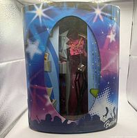 Closed fold-out stage case with window showing contents