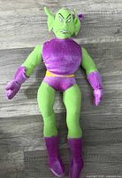 Full view of Green Goblin plush front, showing costume and overall condition