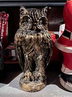 Front view of full owl sculpture