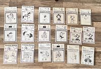 All fifteen sealed Lee Wards transfer pattern envelopes arranged to show front graphics and condition