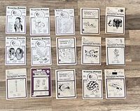 Top-down view of all fifteen sealed transfer pattern envelopes showing individual motif illustrations