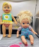 Both dolls front view standing/sitting