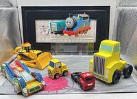 Group shot of all six toy vehicles