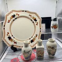 All five ceramic items together: platter, three vases, shaker