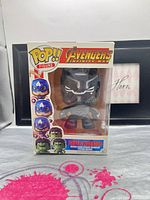 Front view of boxed Super Warrior Pop-style figure