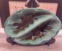 Front view showing divided interior and glaze colors