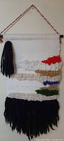 Full view of wool wall hanging showing overall design and colours