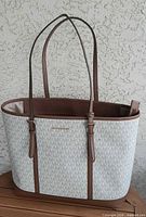 Full view of tote front and straps