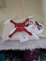 Drone and controller with cable displayed