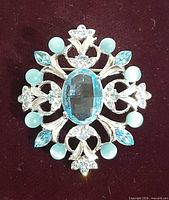 Front view showing overall design and stone arrangement