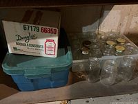 Domglas cardboard case, green tote, tray of mason jars