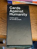 Front of Cards Against Humanity box