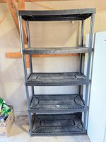 Full view of five-tier plastic shelving unit