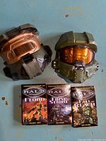 Overview of two masks and three books