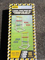 Front of boxed ladder toss game set showing contents and graphics