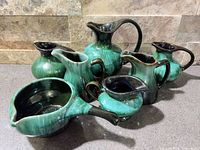 Group shot of all six Blue Mountain Pottery pieces showing forms and glaze