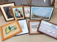 All seven framed artworks displayed together
