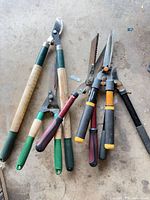 Group shot of the four gardening tools laid out on floor