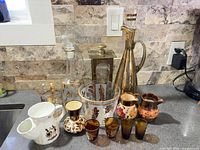 Group shot of all barware and ceramics on countertop