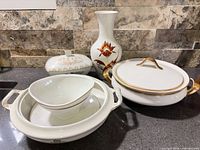 Group view of all six porcelain pieces