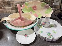 Group shot showing all seven floral dish items