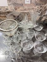 Group shot of all clear glass items on counter