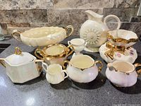 Group shot of all nine vintage lusterware pieces