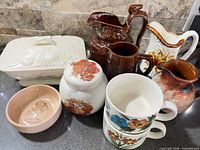 Group shot of all nine ceramic items on countertop