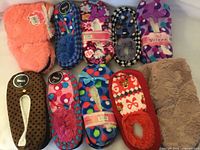 Group shot of all ten assorted slippers