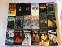 Overall lot laid out showing 18 VHS covers