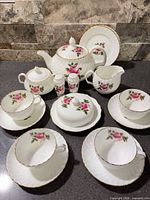 full tea set layout on countertop showing all pieces