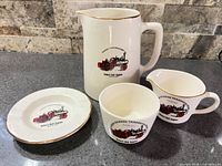 Overall view of four matching ceramic pieces