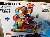 Front of Sumxtech FL1677 box showing set illustration and specifications