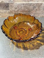Overall view of amber sunflower footed bowl