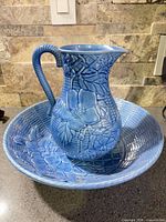 Pitcher inside basin showing overall design and color
