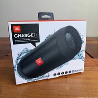 Front box view showing JBL Charge 2+ branding and product image