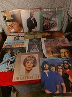Overview of all vinyl record albums spread on table