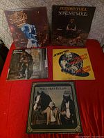 Five Jethro Tull vinyl LPs laid out front covers visible